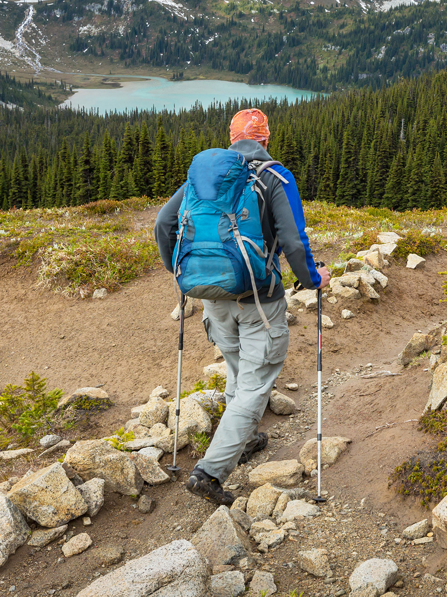 A person hiking up a rocky mountain