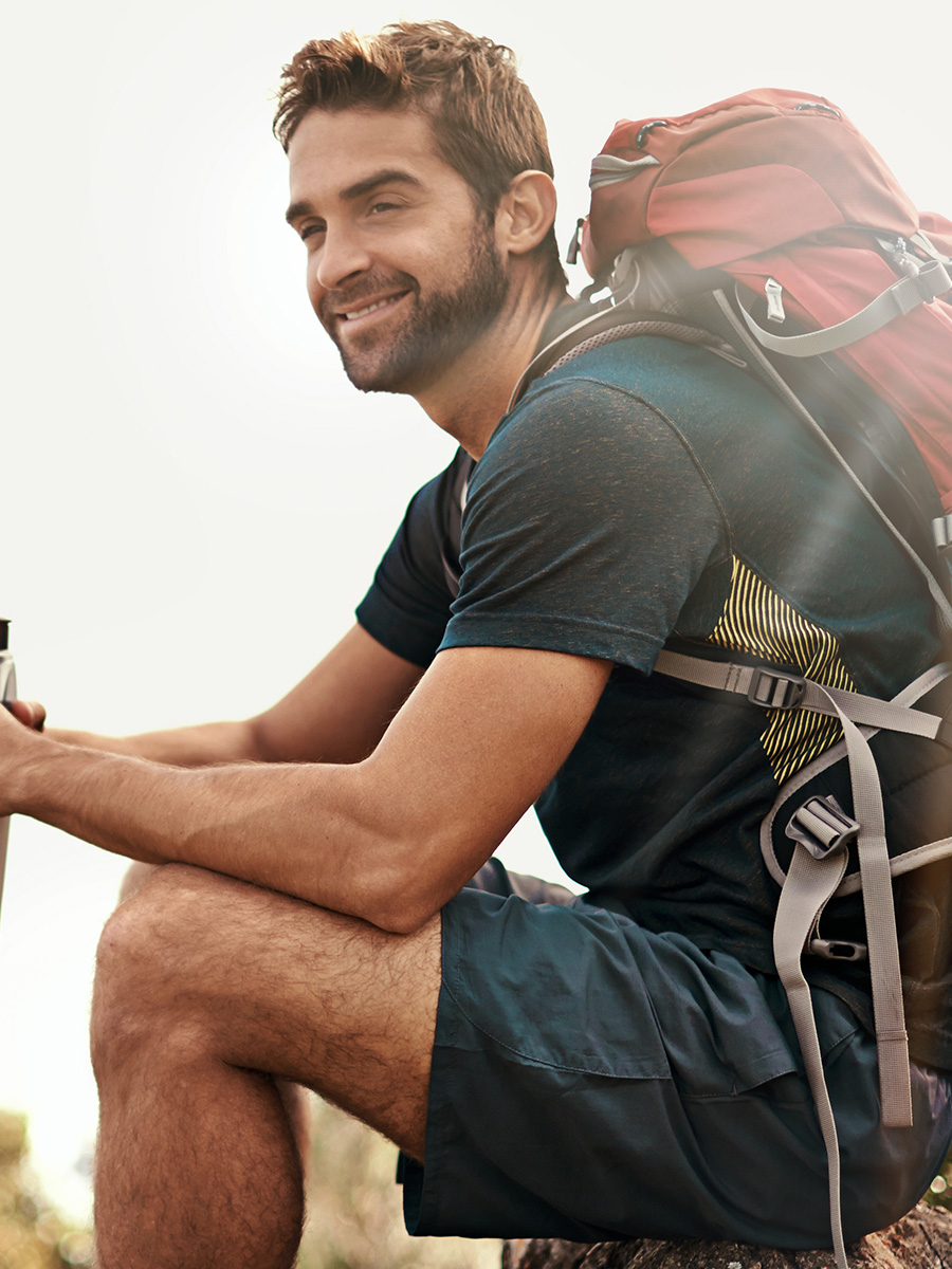 Man sitting down after a hike